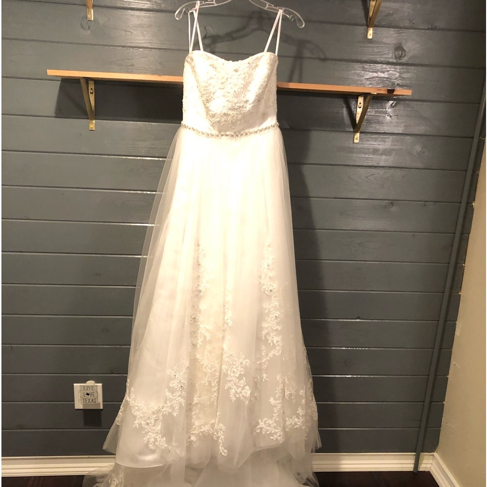 Wedding dress! White, never been worn or altered.